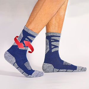 Padded navy hiking crew socks showing flexibility and stretch on model in motion