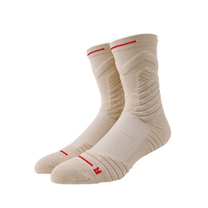 Beige thick padded basketball socks with red stripes compression technology for performance