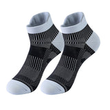 Black and gray ankle socks with striped pattern.